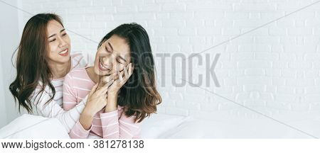 Banner Happy Lesbian Couple Homosexual Happiness Lifestyle On Bed In Cozy Home Bedroom. Two Young Be