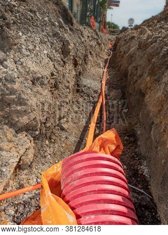 Data Fiber Optic Cables In Ribbed Pipe Under Road. Wire In Hdpe And Protectivep Tube. Building Of Li