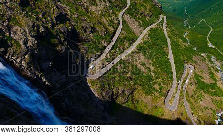 Trolls Path Trollstigen Winding Scenic Mountain Road With Many Cars, Norway Europe. National Tourist