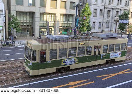 August 5, 2020, Hiroshima, Japan - A Hiroshima Streetcar (hiroden) Run-pass, Through Hondori Street.