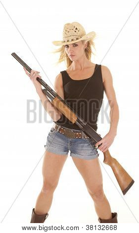 Žena Cowgirl s brokovnicí