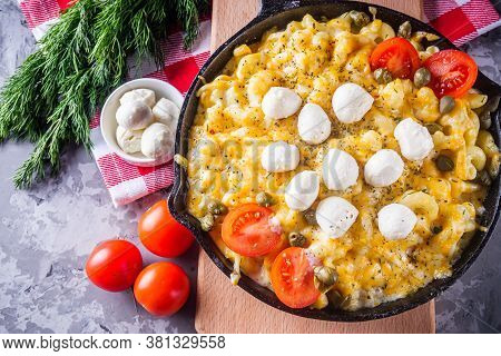 Delicious Pasta And Cheese Casserole In A Cast Iron Skillet