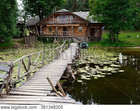 Glubokoe, Belarus - August 5, 2020: Agriturismo Zapavedny Island In The Forest On The Shore Of The L