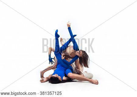 Flexible. Group Of Modern Dancers, Art Contemp Dance, Blue And White Combination Of Emotions. Flexib