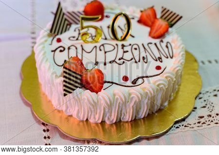 Traditional White Italian Birthday Cake With Congratilations, Buon Compleanno Means Happy Birthday C