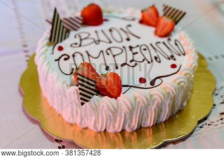 Traditional White Italian Birthday Cake With Congratilations, Buon Compleanno Means Happy Birthday C