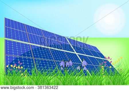 Solar Panel Batteries In A Meadow. Solar Energy. Solar Energy Power Plant On The Grass. Field Agains