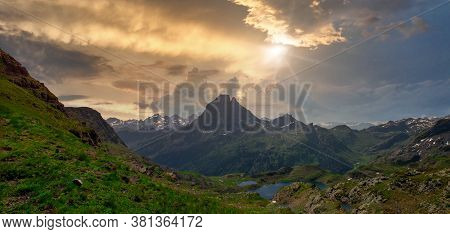 View Of Pic Du Midi Ossau And Ayous Lake In The French Pyrenees Mountains