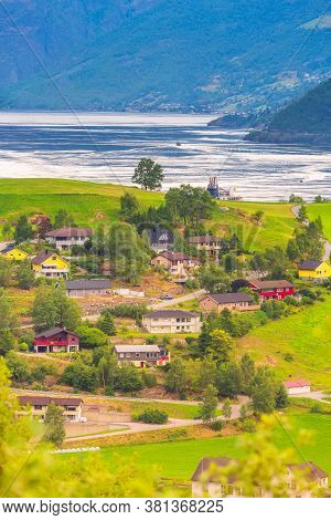 Flam, Norway, Norwegian Fjord Village With Sognefjord Landscape And Cruise Ship