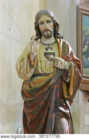 GORNJI DRAGANEC, CROATIA - OCTOBER 02, 2011: Sacred Heart of Jesus statue at the Church of the Visitation of the Blessed Virgin Mary in Gornji Draganec, Croatia