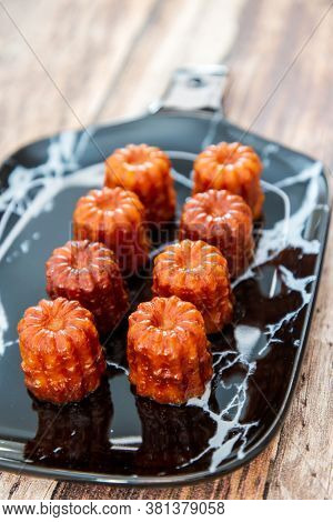 Canele is a small French pastry with rum and vanilla 