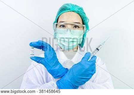 Doctor, Scientist, Researcher Hand In Blue Gloves Or Protective Suit Preparing For Human Clinical In