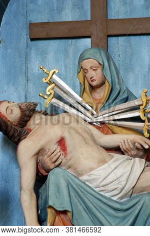LOBOR, CROATIA - AUGUST 25, 2012: Our Lady of Sorrows statue on the altar Our Lady of Seven Sorrows at the Parish Church of Saint Anne in Lobor, Croatia