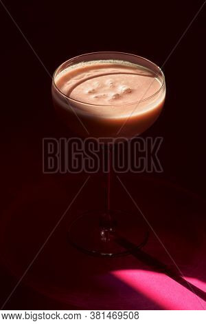 Pina Colada - Tropical Cocktail With Kahlua, Coconut Milk And Rum. Fresh Summer Drink On Purple Back