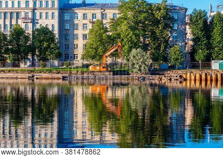 St. Petersburg, Russia - August 19,  2020: Reconstruction And Strengthening Of The Martynov Embankme