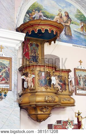 PESCENICA, CROATIA - SEPTEMBER 07, 2013: Pulpit in the parish church of the Assumption of the Virgin Mary in Pescenica, Croatia