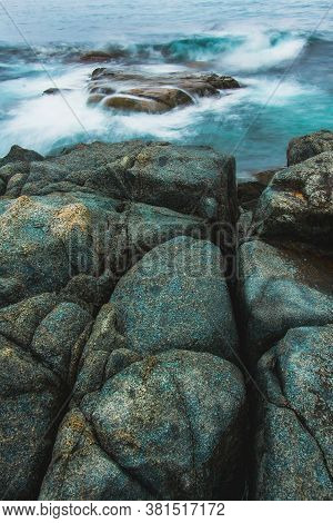 Rocky Sea Shore, Cliffs With Surf On The Gamova Peninsula In The Primorsky Territory, Seascape Of Ru