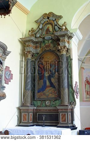 ZAGORSKA SELA, CROATIA - SEPTEMBER 18, 2012: Altar of the Holy Trinity in the parish church of St. Catherine of Alexandria in Zagorska Sela, Croatia