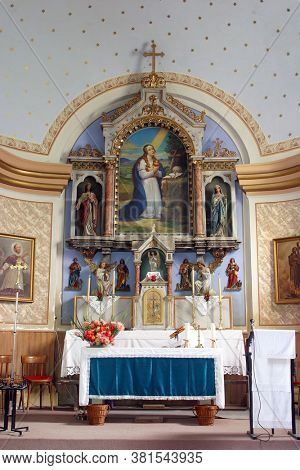SOPJE, CROATIA - NOVEMBER 24, 2014: High altar in the parish church of Saint Mary Magdalen in Sopje, Croatia