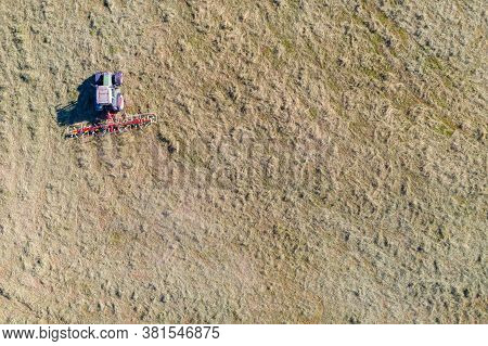 Top View Of Tractor With Tedders, Drying Mowed Hay