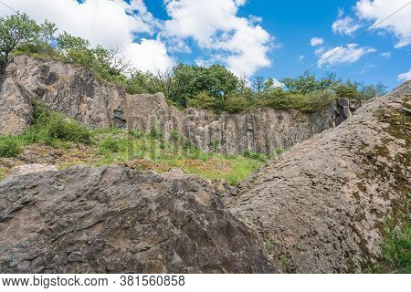 Panoramic View Of Boulders In Front Of A Rock Wall Of The Stenzelberg.
