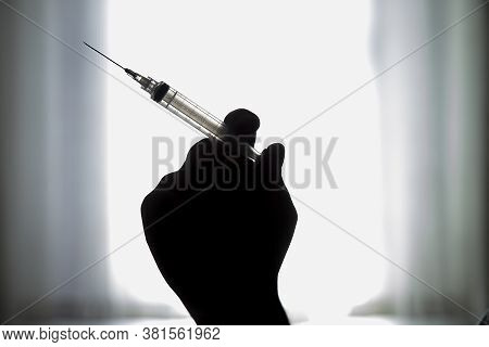 Syringe with vaccine
Preventing the coronavirus or covid-19 pandemic