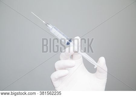 Syringe With Vaccine\preventing The Coronavirus Or Covid-19 Pandemic