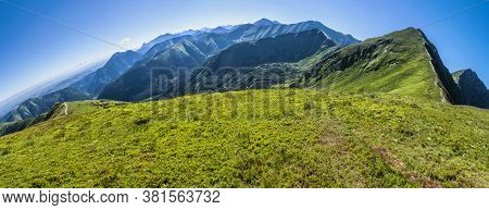 Panoramic Photo Of Western Tatras From Rakon Peak, Slovak Republic. Hiking Theme. Seasonal Natural S