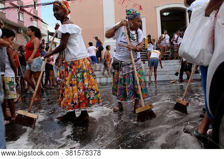 Salvador, Bahia / Brazil - February 22, 2014: Members Of The Bando Anunciador And Residents Of The I