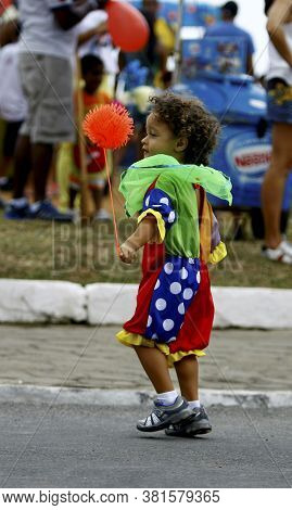 Salvador, Bahia / Brazil - September 21, 2014: Child Is Seen Playing In The Rio Vermelho Neighborhoo
