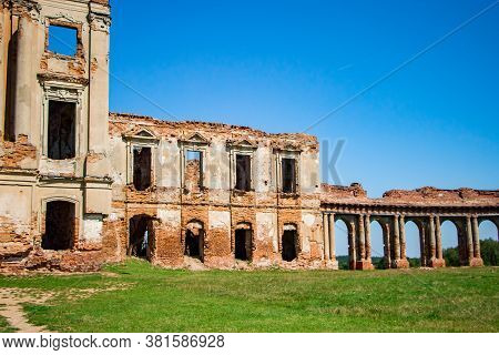 The Ruins Of A Medieval Castle In Ruzhany. View Of The Ruined Old Palace Complex With Columns. Brest