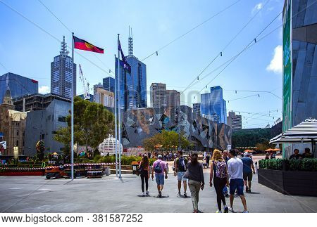 Melbourne, Australia - Dec 26, 2019: People Walking Towards Federation Square, A Venue For Arts And 