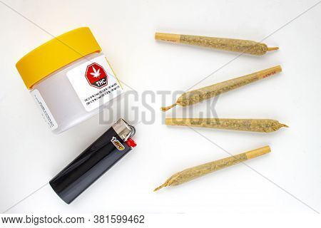 Calgary, Alberta, Canada. Aug 19, 2020. A Cannabis White And Yellow Plastic Packaging Container With
