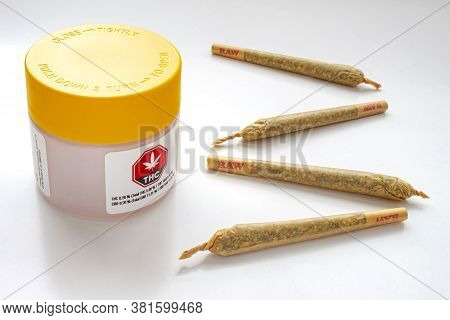 Calgary, Alberta, Canada. Aug 19, 2020. A Cannabis White And Yellow Plastic Packaging Container With