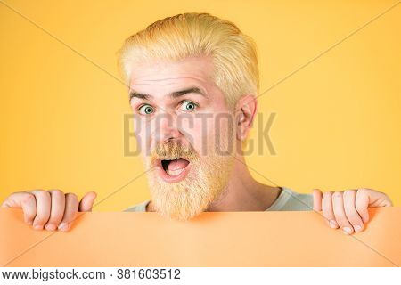 Excited Man Showing A Blank White Board, Close Up. Copy Space