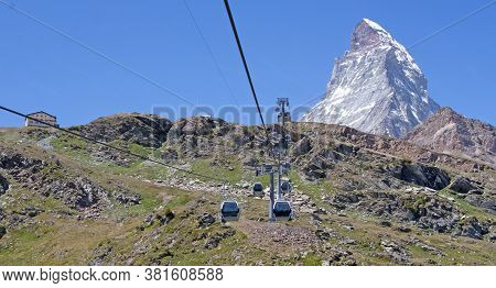 The Matterhorn, The Iconic Emblem Of The Swiss Alps, Cablecar, Summertime