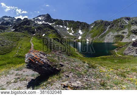 The Lac Bleu In Chianale, Mountain Lake In The Italian Alps Of Cuneo, Piedmont.