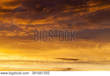 Beautiful Cloudy Sky During Sunset Or Dawn With Warm Colors And Shades, Natural Phenomena, The Sun A