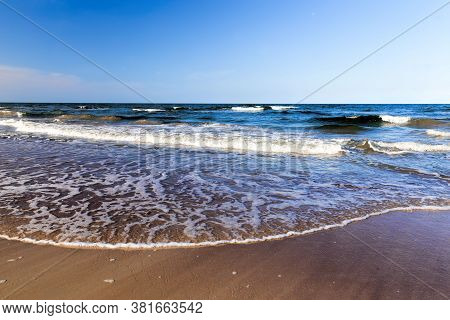Daytime On The Baltic Sea Coast, Cold Water In The Month Of August, Beautiful Nature