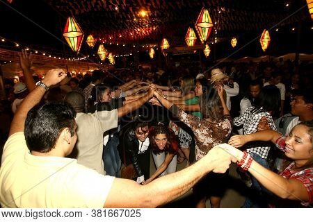 Ilheus, Bahia / Brazil - June 23, 2011: People Are Seen Dancing Forro And Hillbilly Dresses During S