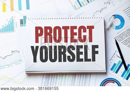 Notebook With Tools And Notes About Protect Yourself