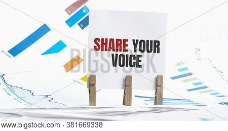 Share Your Voice Text On Paper Sheet With Chart, Dice, Spectacles, Pen, Laptop And Blue And Yellow P