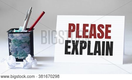 Blank Sheet, Pen And Crumpled Paper Balls On Grey Table, Flat Lay. Text Please Explain