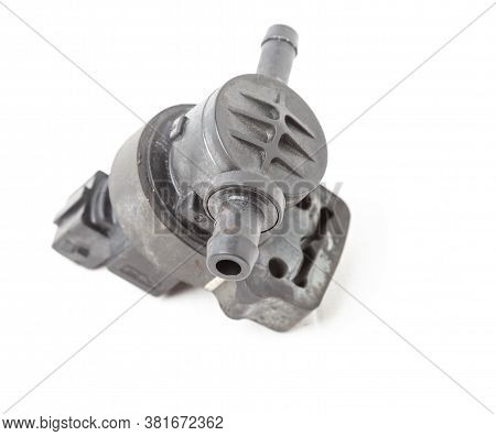Heating System Valve Made Of Black Plastic On A White Isolated Background In A Photo Studio. A Unit 