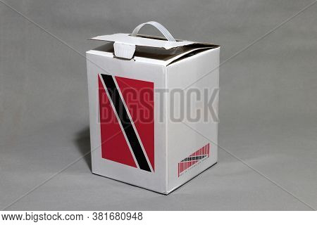 Trinidadian Flag On White Box With Barcode And The Color Of Trinidad And Tobago Flag, Paper Packagin