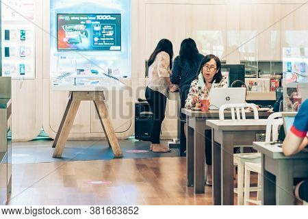 Bangkok-thailand, July 14, 2020: Unidentified Customers Work On Computer With Smartphone And Relax W