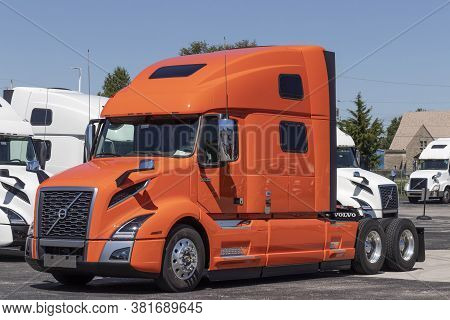 Indianapolis - Circa August 2020: Volvo Semi Tractor Trailer Trucks Lined Up For Sale. Volvo Is One 