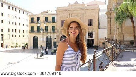 Beautiful Smiling Tourist Woman Visiting The Old Town Of Palermo In Sicily, Italy