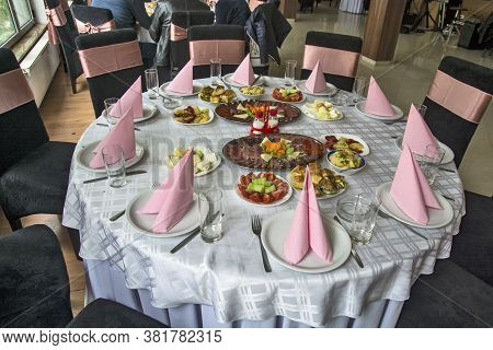 Beautifully Arranged Various Cured Meat Products Served On The Table.