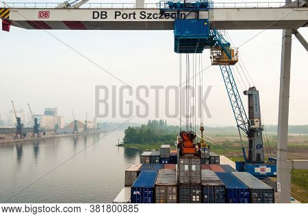 Szczecin, Poland - May 12, 2011: Unloading A Container Ship In The Stetting Sea Port In Poland. The 